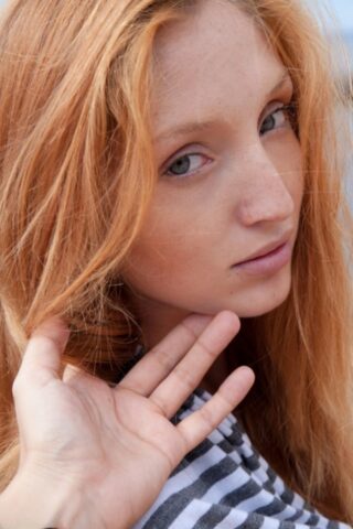 Cute ginger babe Michelle H strips on the beach & shows her phenomenal body