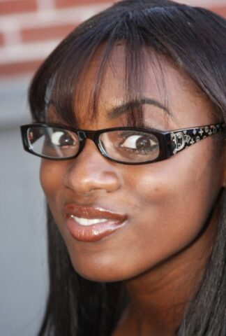 Cute ebony Ana Foxxx in glasses coupies down for some hot gloryhole action