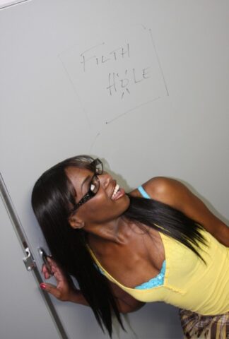 Cute ebony Ana Foxxx in glasses coupies down for some hot gloryhole action