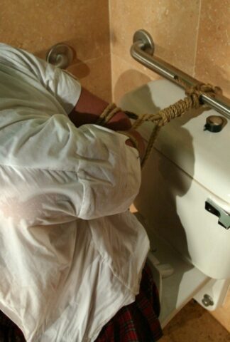 Schoolgirl Talia Monet gets manhandled by the janitor in the bathroom