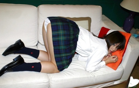 93155606_006_4cb7 Naughty asian schoolgirl Hikaru Koto slipping off her uniform